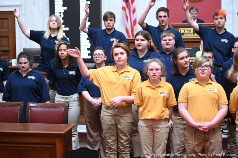 Students from the WV Schools for the Deaf & Blind sign while singing
